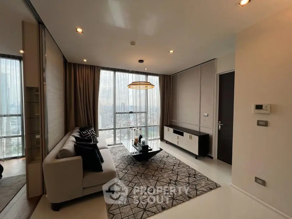 Modern living room with city view, stylish decor, and natural light.