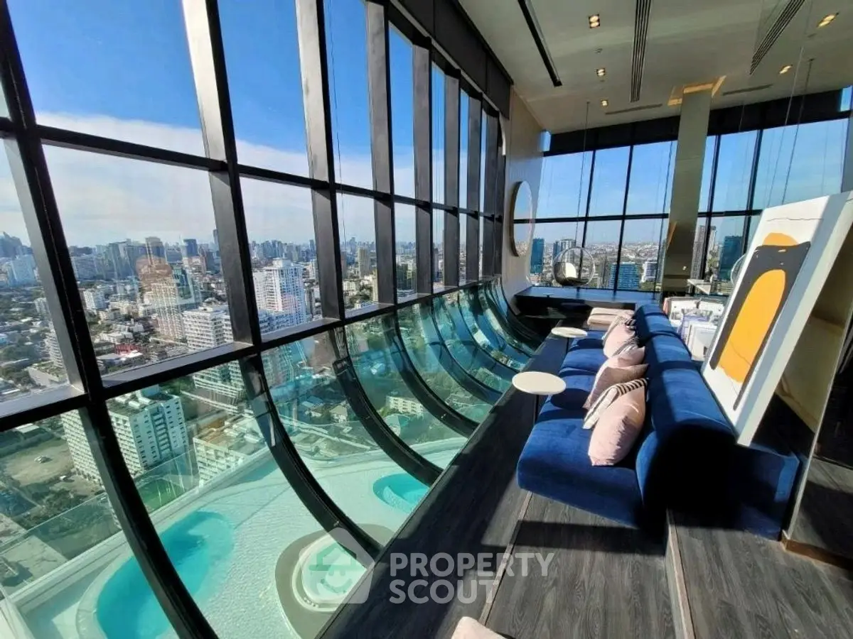 Luxurious high-rise apartment with stunning city view and modern interior design.