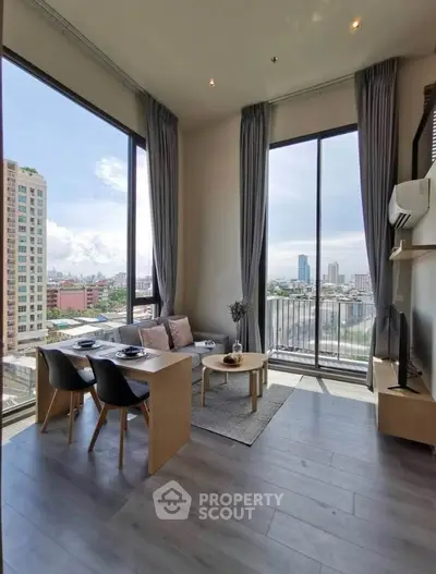 Modern living room with floor-to-ceiling windows and city view