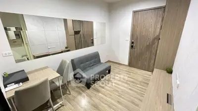 Modern study room with sleek wooden flooring and minimalist furniture
