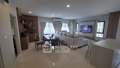 Spacious modern living room with elegant decor and natural light