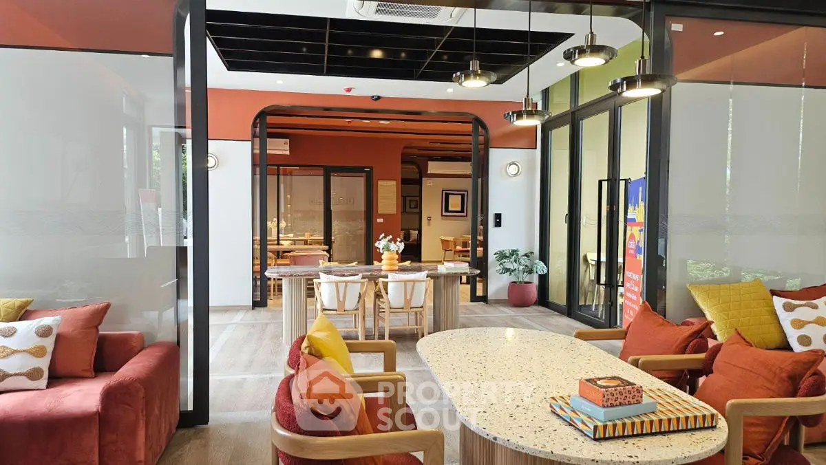 Modern living room with stylish furniture and open layout, perfect for entertaining guests.