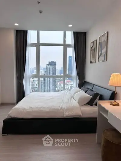 Modern bedroom with city view and stylish decor