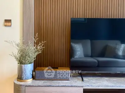 Modern living room with stylish TV setup and elegant decor