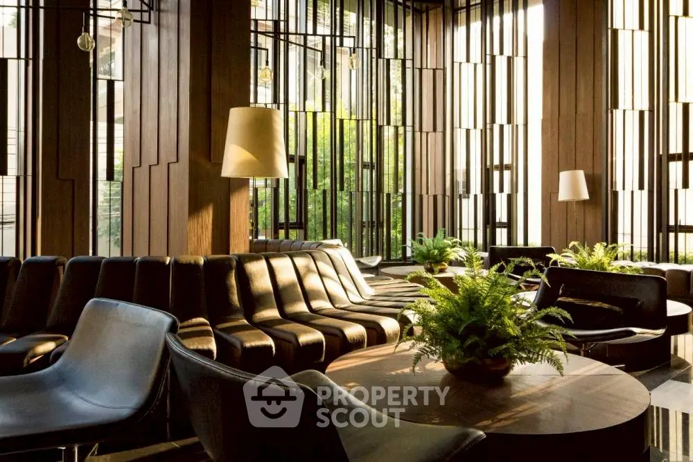 Luxurious modern living room with stylish seating and lush greenery