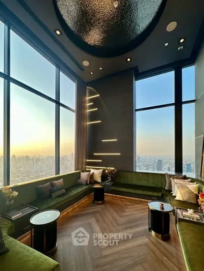 Luxurious high-rise living room with panoramic city views and elegant decor