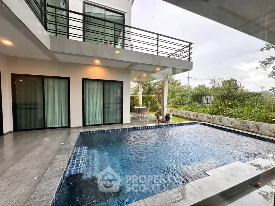 Luxurious modern home with private pool and spacious outdoor area, perfect for relaxation and entertainment.