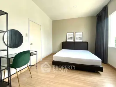 Modern minimalist bedroom with stylish decor and natural light