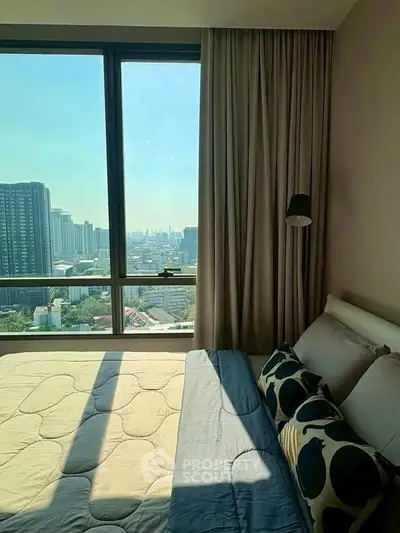 Luxurious bedroom with stunning city view and modern decor