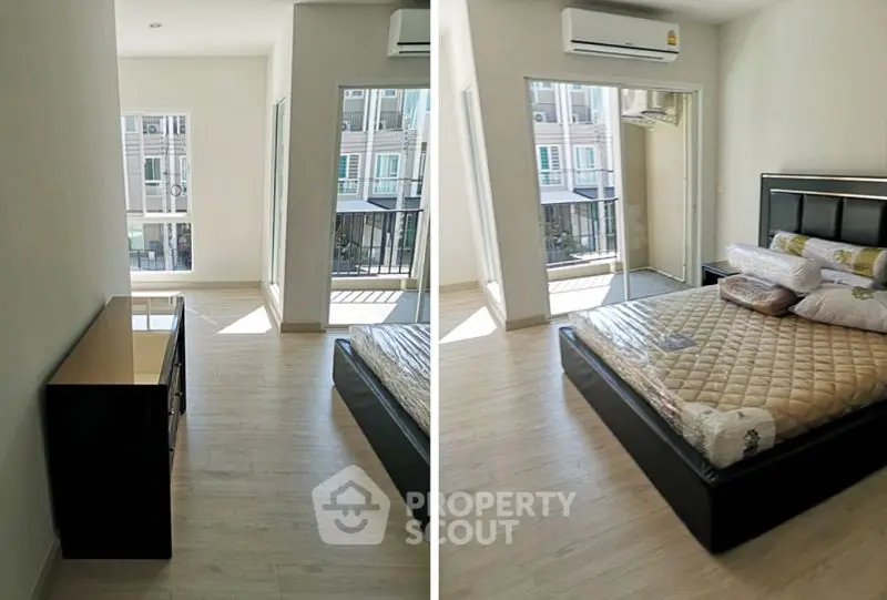 Modern bedroom with balcony access and sleek furnishings in a bright apartment.