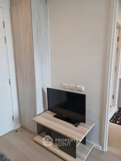 Modern living room with sleek TV stand and minimalist decor