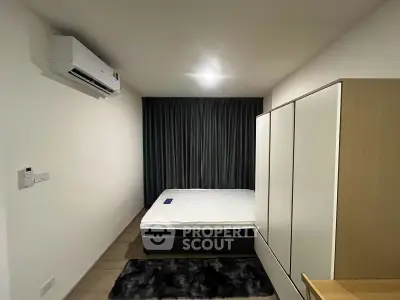 Modern bedroom with air conditioning and sleek wardrobe design