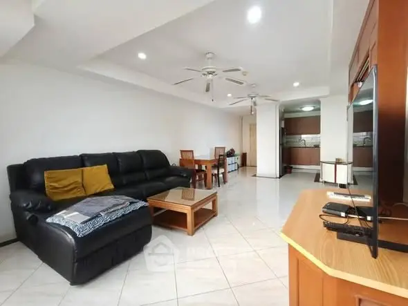 Spacious living room with modern furniture and open layout