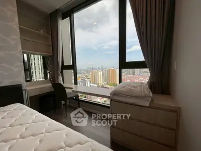 Stunning bedroom with panoramic city view and elegant furnishings