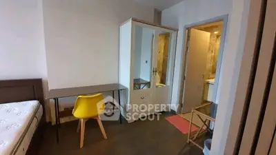 Modern bedroom with study area and ensuite bathroom in stylish apartment