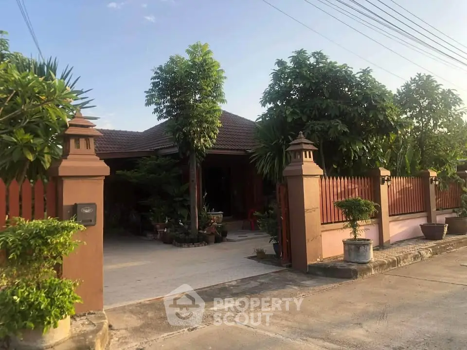 Charming suburban house with lush garden and inviting entrance