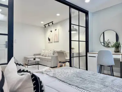 Modern open-plan living room with stylish decor and cozy ambiance