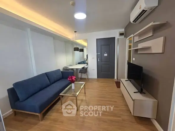 Modern living room with sleek furniture and stylish decor