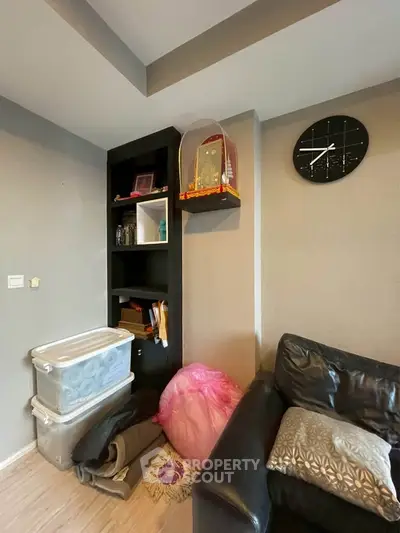 Cozy living room corner with modern decor and storage solutions