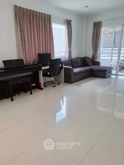 Spacious living room with modern furniture and natural light