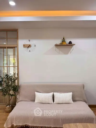 Cozy living room with modern decor and comfortable seating