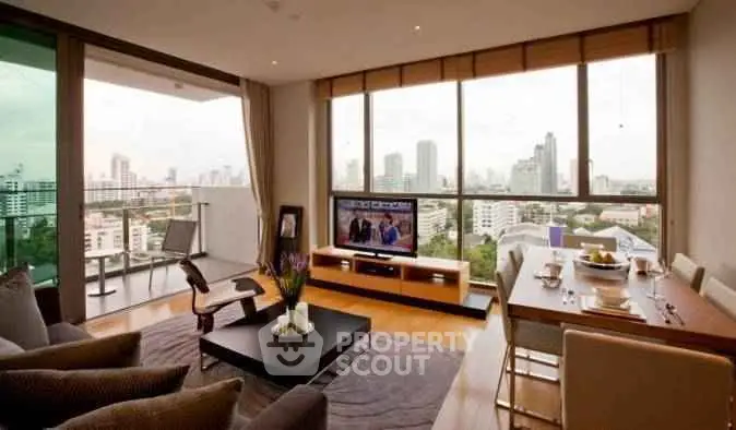 Luxurious living room with stunning city view and modern decor