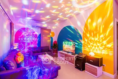 Vibrant living room with colorful lighting and modern decor