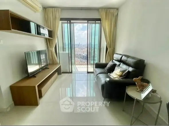 Modern living room with city view, sleek furniture, and large windows.