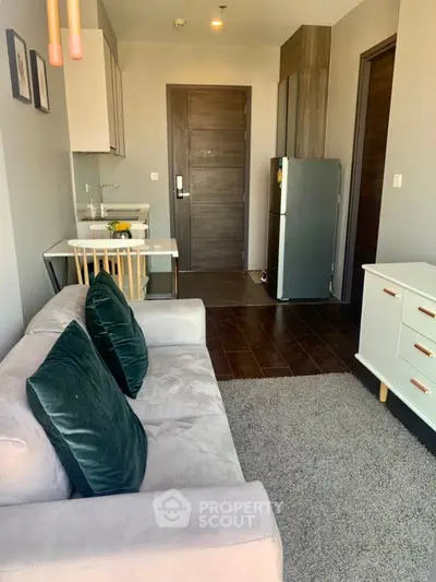 Cozy modern living room with kitchenette and stylish decor