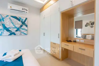 Modern bedroom with built-in wardrobe and stylish decor
