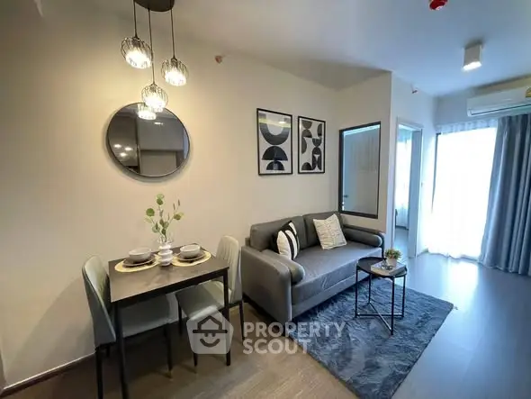 Modern living room with stylish decor and cozy seating area, perfect for relaxation.