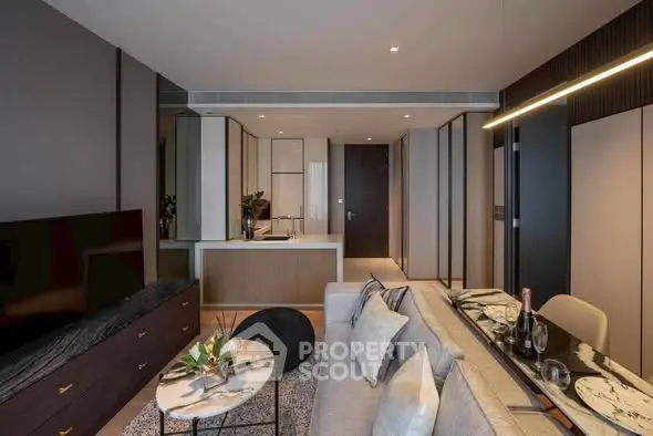 Modern living room with sleek design, open layout, and stylish furnishings in a luxury apartment.