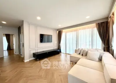 Spacious modern living room with elegant decor and natural light