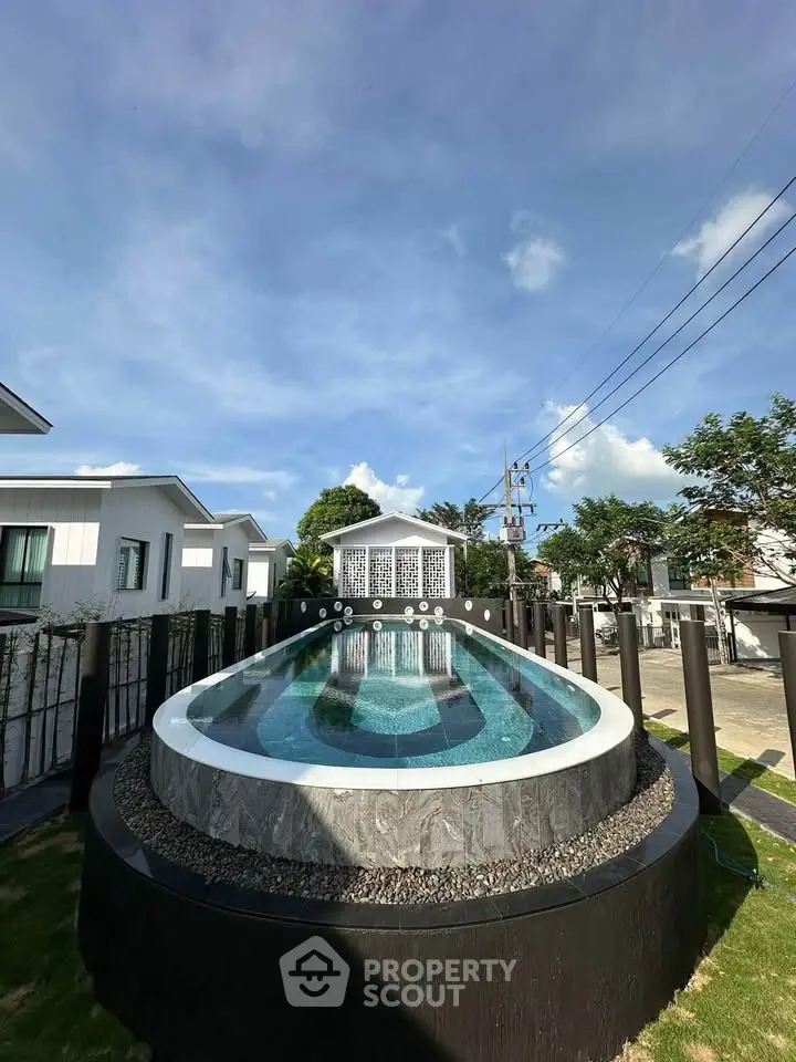 Stunning modern pool with sleek design in a luxurious residential area
