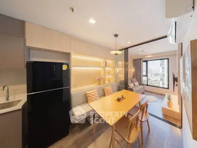 Modern open-plan kitchen and dining area with stylish decor and city view.