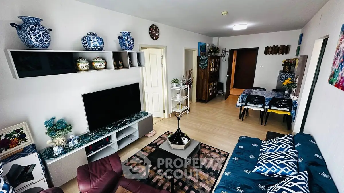 Spacious living room with modern decor and stylish furniture