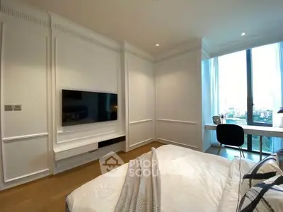 Luxurious bedroom with modern decor and large window offering stunning city views.