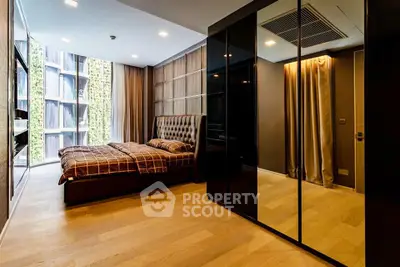 Luxurious modern bedroom with floor-to-ceiling windows and elegant furnishings