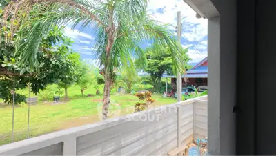 Charming rural property with lush greenery and spacious outdoor area, perfect for nature lovers.