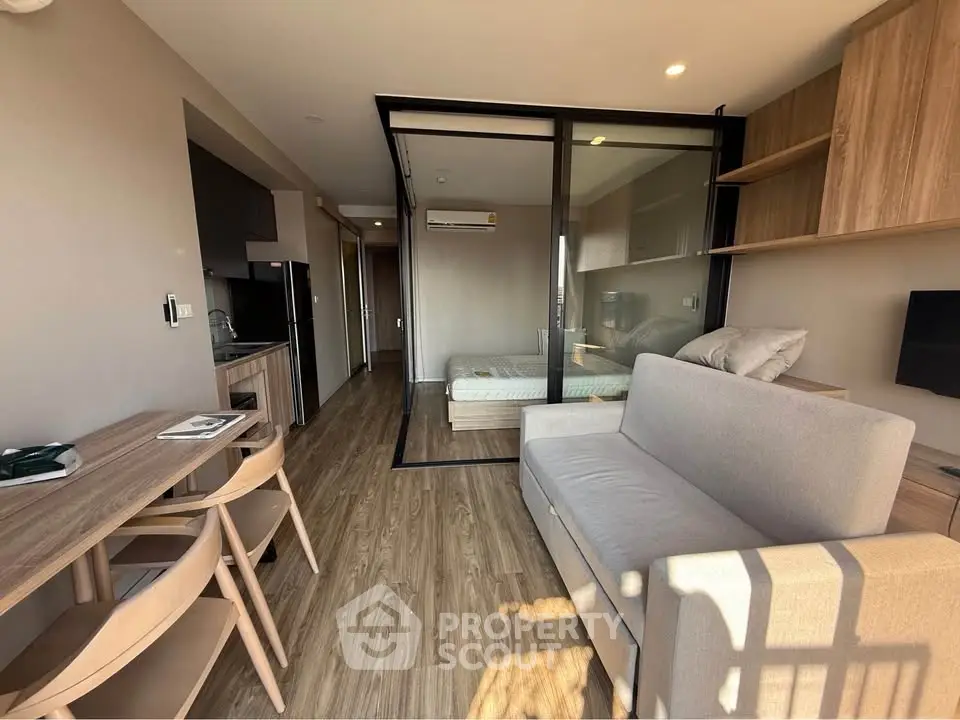 Modern studio apartment with open layout and stylish furnishings