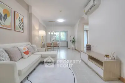 Spacious modern living room with elegant decor and natural light