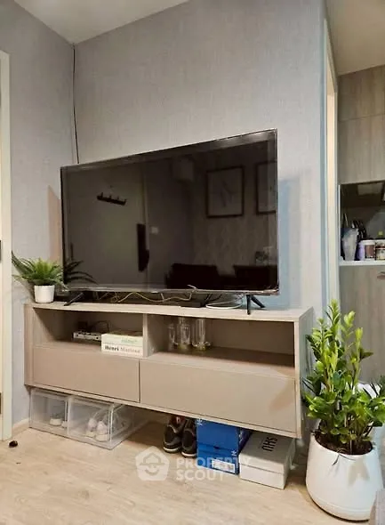 Modern living room with sleek TV stand and stylish decor