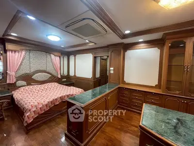 Luxurious wooden bedroom with elegant furnishings and ambient lighting