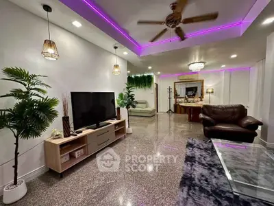 Spacious modern living room with stylish lighting and elegant decor
