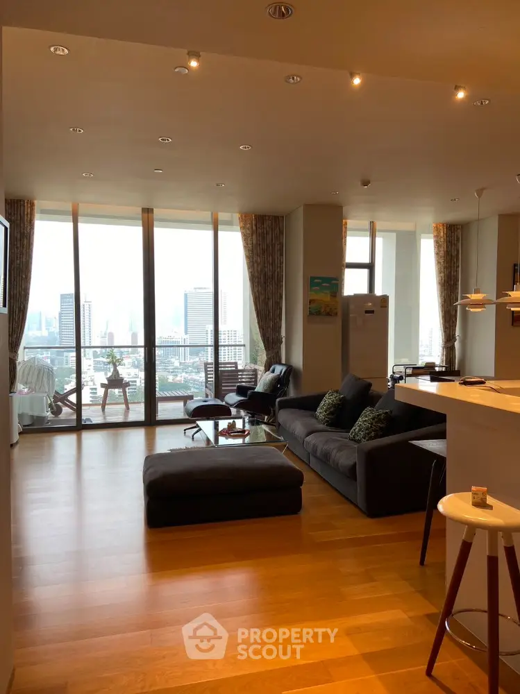 Spacious modern living room with city view and elegant furnishings