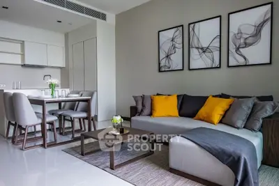 Modern living room with stylish decor and open kitchen layout