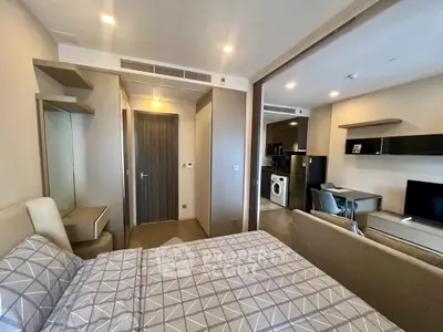 Modern studio apartment with open layout and stylish furnishings