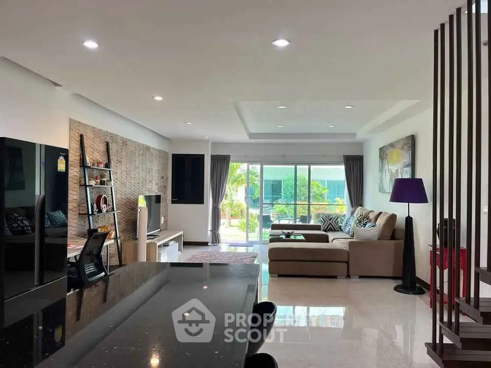 Spacious modern living room with open layout and stylish decor