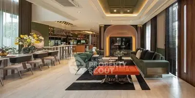 Luxurious open layout living room with modern decor and ample natural light.