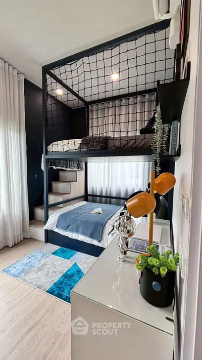 Modern bedroom with stylish bunk bed and contemporary decor